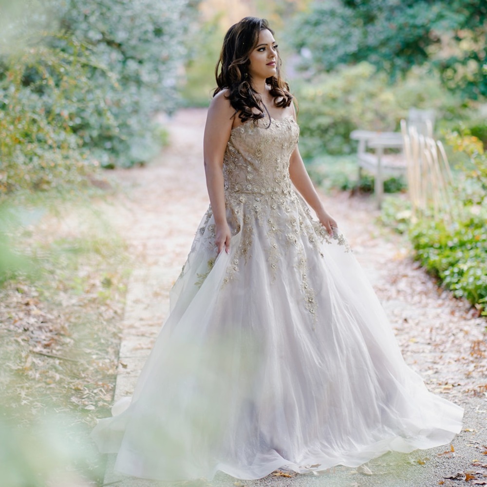 Strapless ball gown beige dress with shimmer lining & floral appliqué